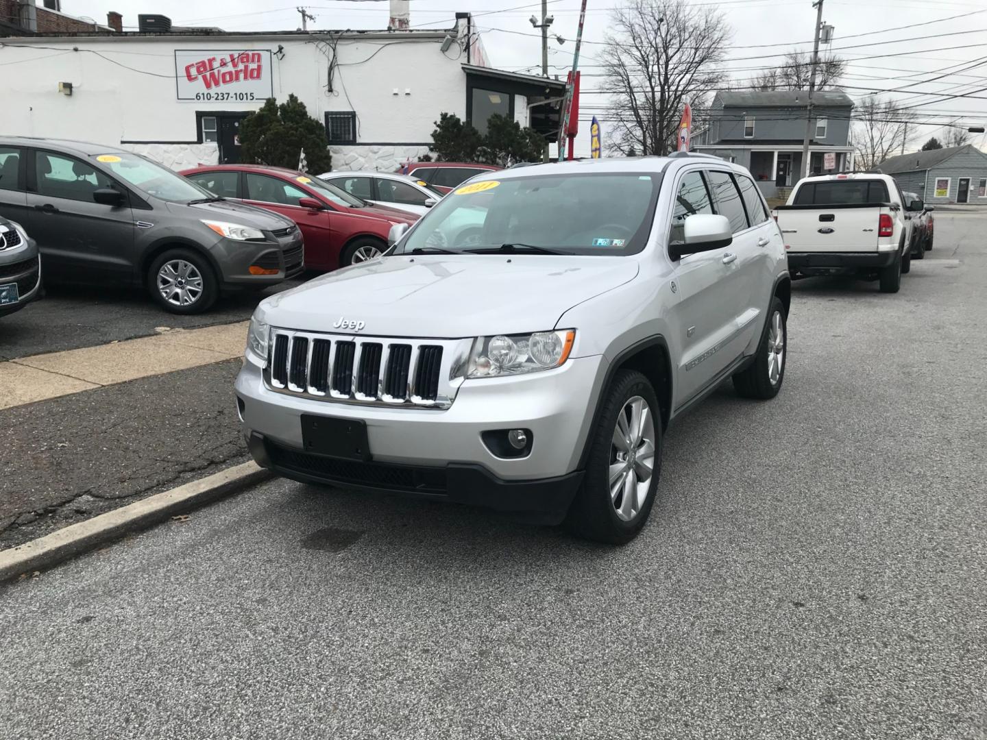 2011 Silver /Black Jeep Grand Cherokee Laredo (1J4RR4GTXBC) with an 5.7 Liter HEMI engine, Automatic transmission, located at 577 Chester Pike, Prospect Park, PA, 19076, (610) 237-1015, 39.886154, -75.302338 - Photo#2